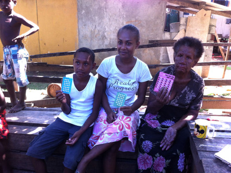 These three people from the same family were diagnosed with leprosy and given their first blister pack of treatment - the blue packs are treatment for pauci bacillary leprosy and will be taken for 6 months, and the red pack (on the right) is for multi-bacillary leprosy and needs to be taken for 12 months